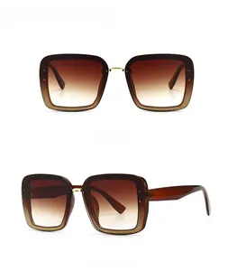 Front and 45-degree side views of tan square oversized sunglasses with gold metal bridge