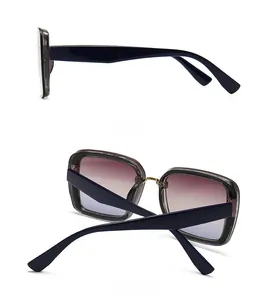 Detail view of square gradient sunglasses with gold bridge showing side and back angles