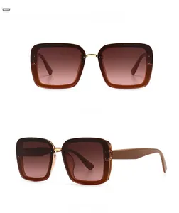 Front and side view of square sunglasses with dark red grey pink gradient lenses