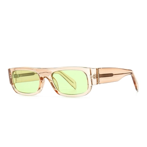 Retro rectangular sunglasses with peach acetate frames and light green lenses