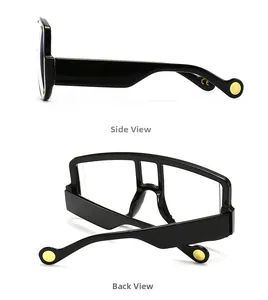 Side and back view of oversized black sunglasses with thick legs and yellow rivets