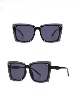 Front and 45-degree side views of large square black sunglasses with metal rivet details