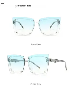 Close-up of transparent blue square sunglasses with silver metal rivets and gradient lens