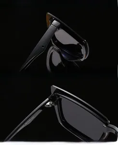 Detailed macro view of durable metal hinges and black square frame on oversized sunglasses