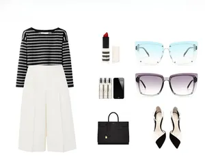 Flat lay of stylish oversized square sunglasses paired with chic urban fashion accessories