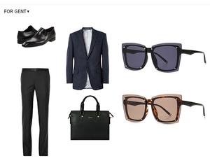 Flat lay of square sunglasses in black and tortoiseshell with navy suit and leather bag