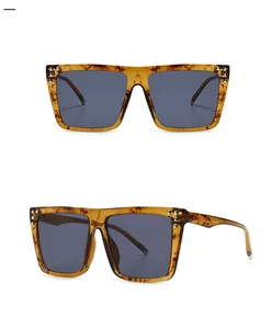 Front and side view of square tortoiseshell sunglasses with dark grey lenses and metal studs