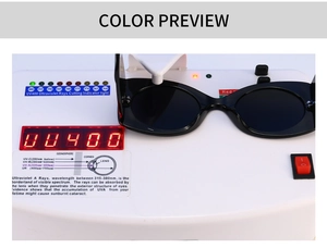 Detail shot of black rectangle sunglasses undergoing professional UV400 protection testing