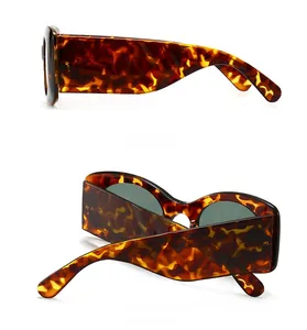 Detail view of tortoiseshell retro sunglasses showing side and back wide temple design