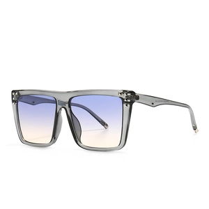 Modern retro square frame sunglasses with grey transparent frame and blue yellow gradient lens