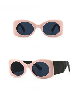 Pink matte sunglasses with wide black temples showing front and 45-degree side angles