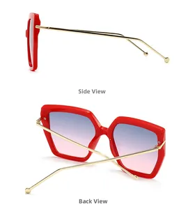 Side and back view of oversized red frame sunglasses with gold temples and gradient lenses