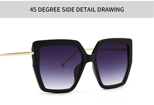 Detail view of oversized black sunglasses with purple gradient lenses and gold metal temples