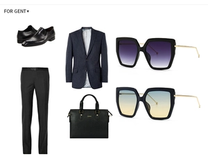 Flat lay of retro large frame square sunglasses paired with a classic navy business suit set