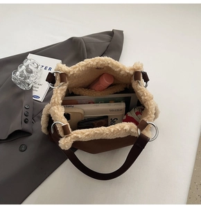 Top view of plush bucket bag showing large capacity for tablet, phone and books