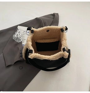 Interior detail of large tote bag with plush sherpa lining and inner pocket