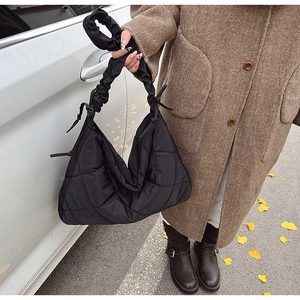 Quilted nylon crossbody bag with chic ruched strap detail and large capacity design