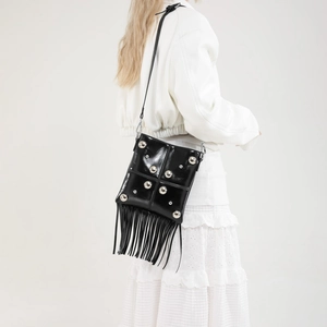 Retro studded motorcycle crossbody bag with tassels and sleek glossy finish