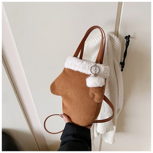 Creative brown glove-shaped handbag with white faux fur trim and adjustable strap