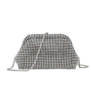 Elegant silver rhinestone clutch bag with luxury crystal mesh design and metal chain strap