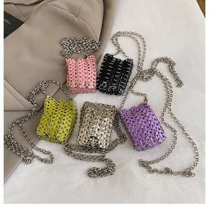 Detailed arrangement of woven mini sequin chain bags in five vibrant metallic colors