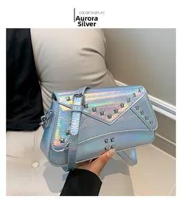 Detail of Aurora Silver holographic PU cross-body bag with star and square rivets