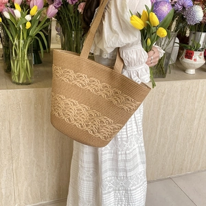 High-quality straw tote bag with wave texture for beach vacations and summer outfits