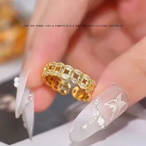Adjustable gold zircon ring with luxury hollowed coin pattern for elegant women