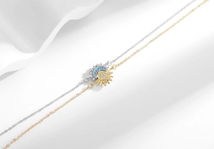 Detailed view of magnetic sun and moon couple bracelets with cubic zirconia inlays