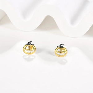Halloween pumpkin stud earrings with black wizard hat and crystal on white surface