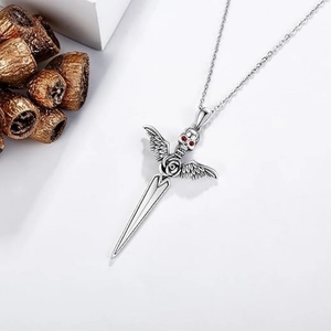 Gothic silver skull pendant necklace with bat wings, sword and red zircon eyes