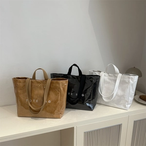 Stylish large capacity tote bag in Dupont paper with double handles and letter print