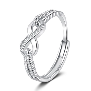 Adjustable infinity silver ring with crystals and twisted rope band on white background