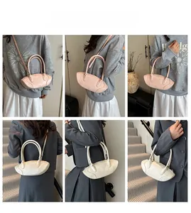 Fashionable half-moon handbags in soft pink and pearl white colors for women