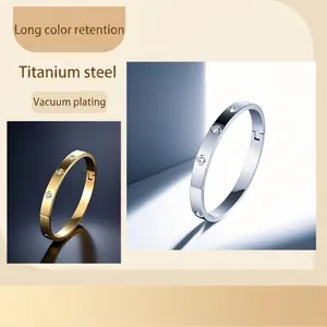 Classic 18k gold plated stainless steel bangles with screw design and crystal inlay