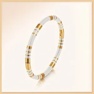 Minimalist white enamel and gold plated stainless steel layered bangle for women