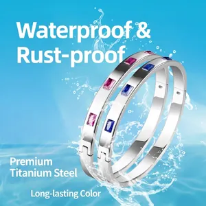 Titanium steel bangles with rectangular pink and blue zircon stones and water splash effect