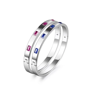 Minimalist stainless steel bangle set with polished finish and rectangle colored gemstones
