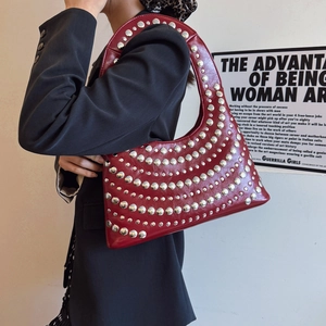 Dark red punk style underarm bag with silver rivets and half-moon design for women