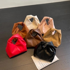 Chic ruched leather handbags with knot handles available in seven elegant colors