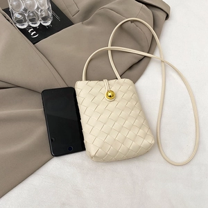 Chic off-white woven vertical phone bag with gold bead clasp and slim shoulder strap