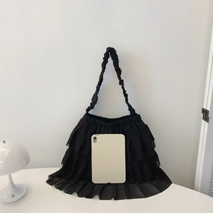 Sweet black ruffle tote bag with tiered lace layers and drawstring shoulder strap
