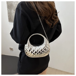 Detailed close-up of a silver mirror quilted half-moon bag with elegant chain strap