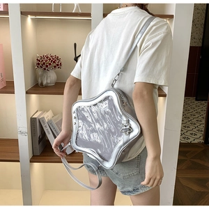 Bolso ita plateado en forma de estrella con ventana de malla y correa ajustable