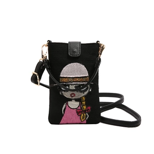 Petit sac bandoulière noir en toile avec motif de fille en paillettes colorées
