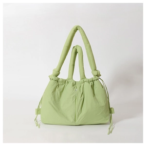 Light green puffer nylon tote bag with thick padded handles and large capacity