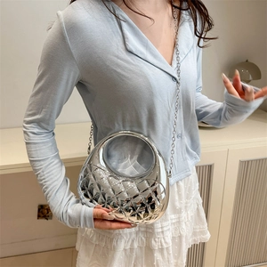Silver metallic crossbody evening bag with quilted pattern and elegant chain strap