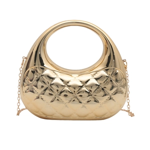 Elegant gold acrylic evening handbag with quilted pattern and chain shoulder strap