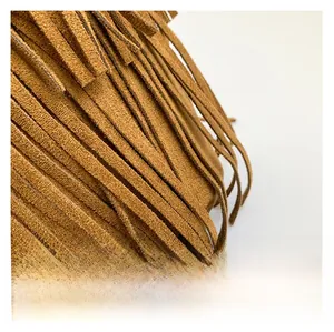 Close-up of premium brown suede tassel fringe with high-quality leather texture details