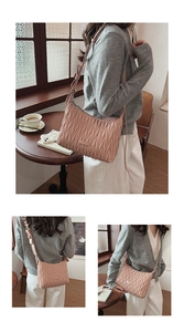 Multiple views of a pink pleated crossbody bag with a soft leather texture on a model